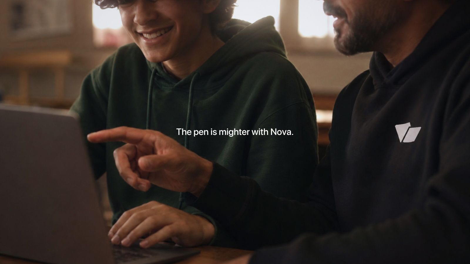 A learner and tutor at a laptop. The pen is mightier with Nova.